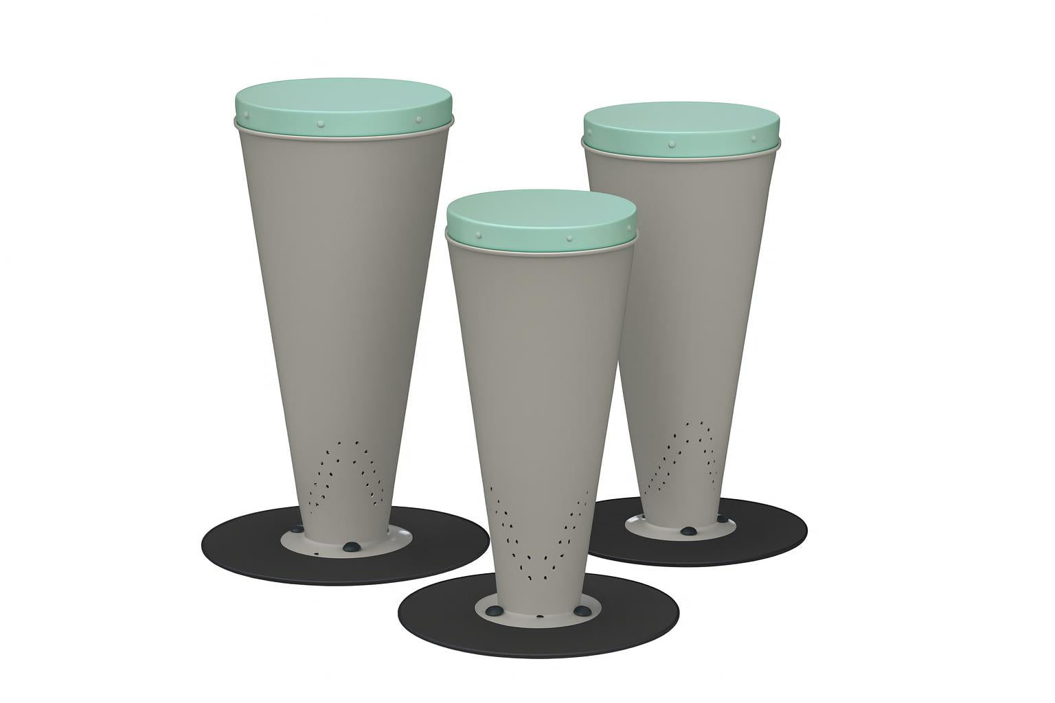 Bossa Nova Drums outdoor percussion set with three taupe synthetic-headed steel drums on black bases on grass in a park setting