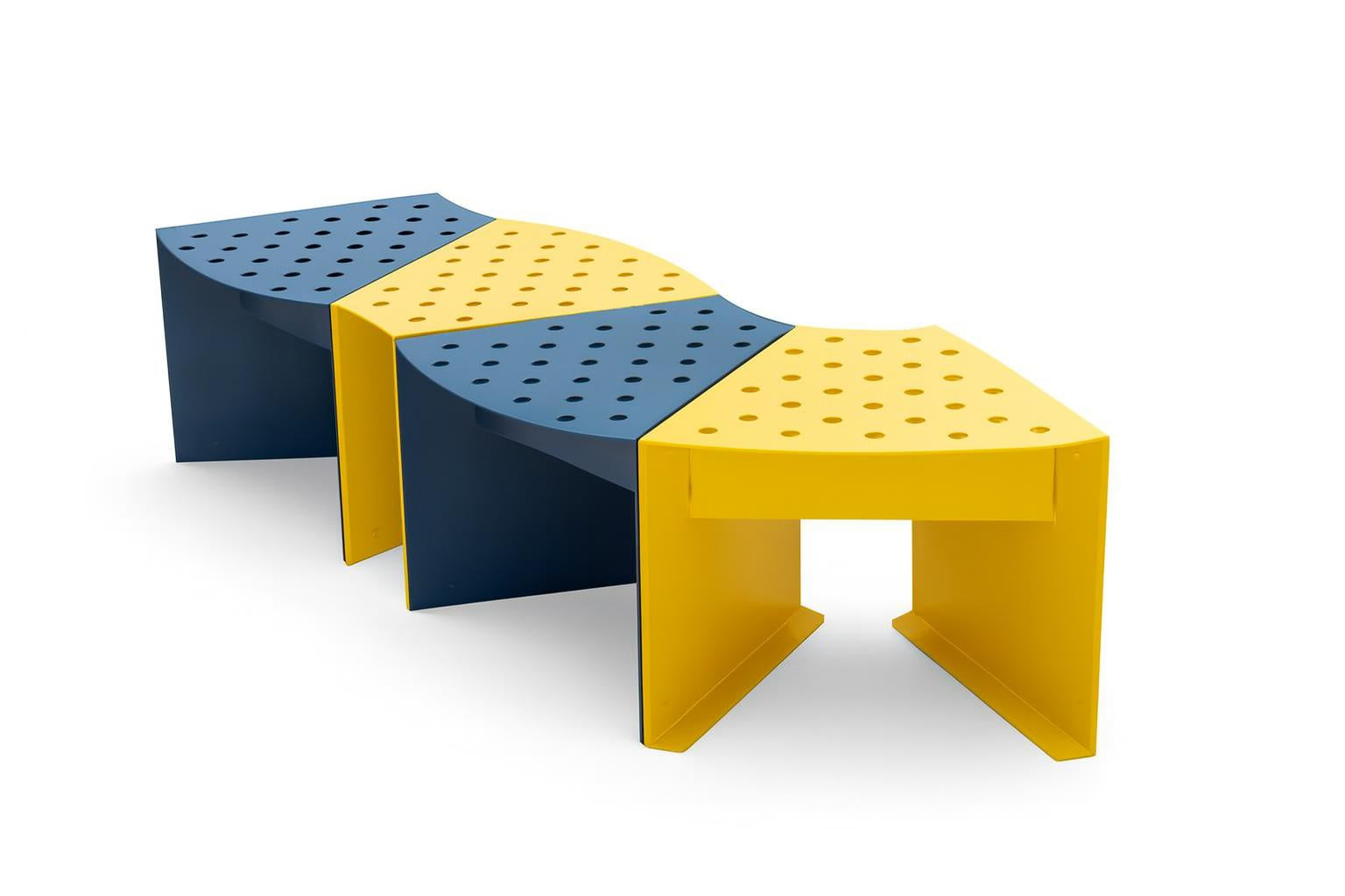Pasadena Modular Bench with alternating yellow and blue perforated steel segments in a modern modular design on grass