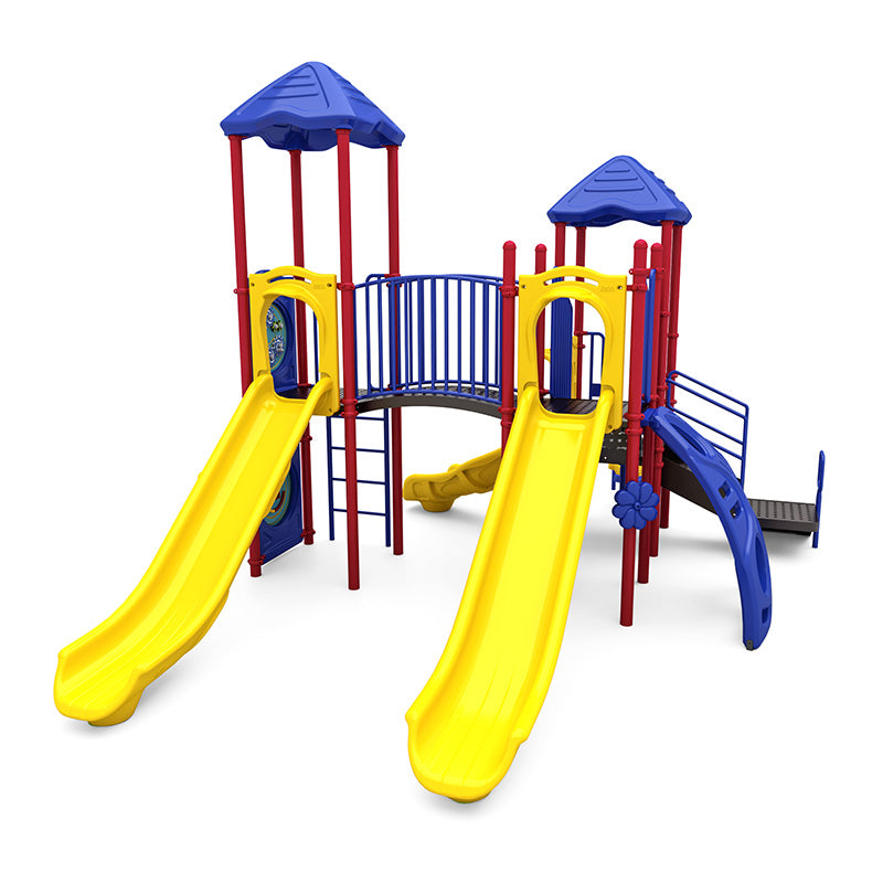 Colorful playground structure with yellow slides, blue roofs, red posts, climbing ladder, and interactive play panels including gears and musical bongos.