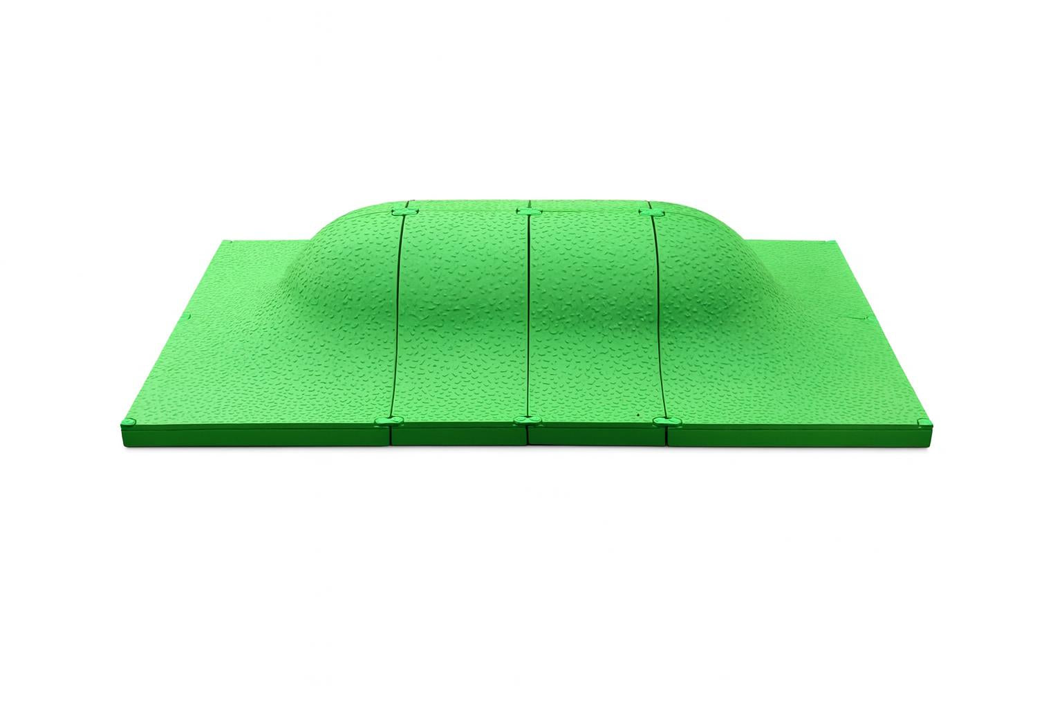 Snug Play Standard Mound green textured curved play mound on artificial grass for interactive outdoor children's play and exploration
