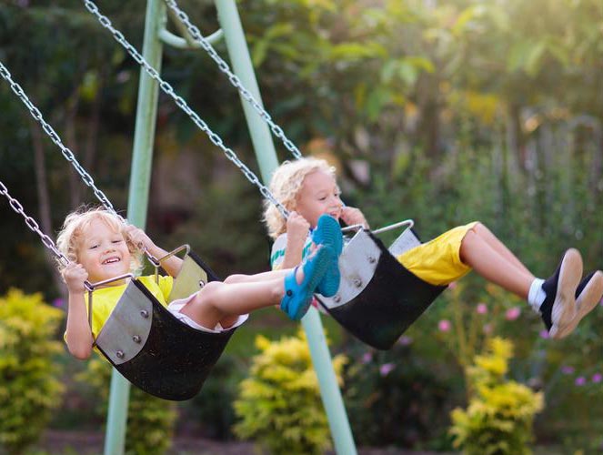 Playground Swing Sets - Kids swing on park swing set