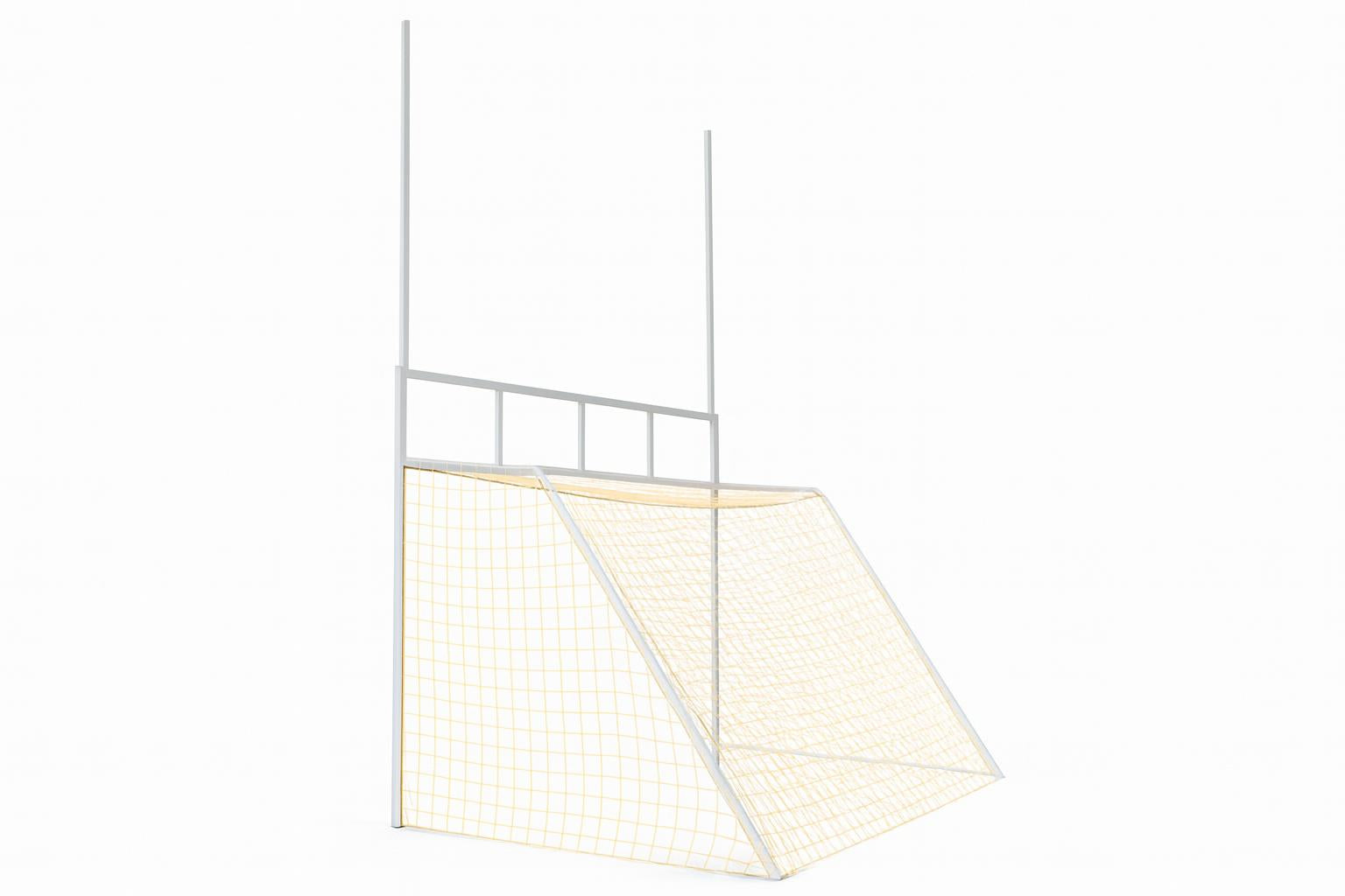 Combined Football And Soccer Goal with white frame and orange netting on green field under clear blue sky