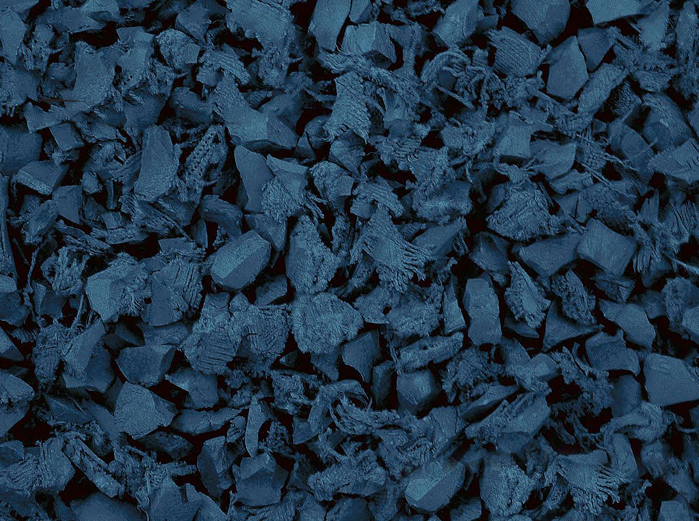 A close up image of a pile of Rubber Mulch Playground Rubber Mulch.