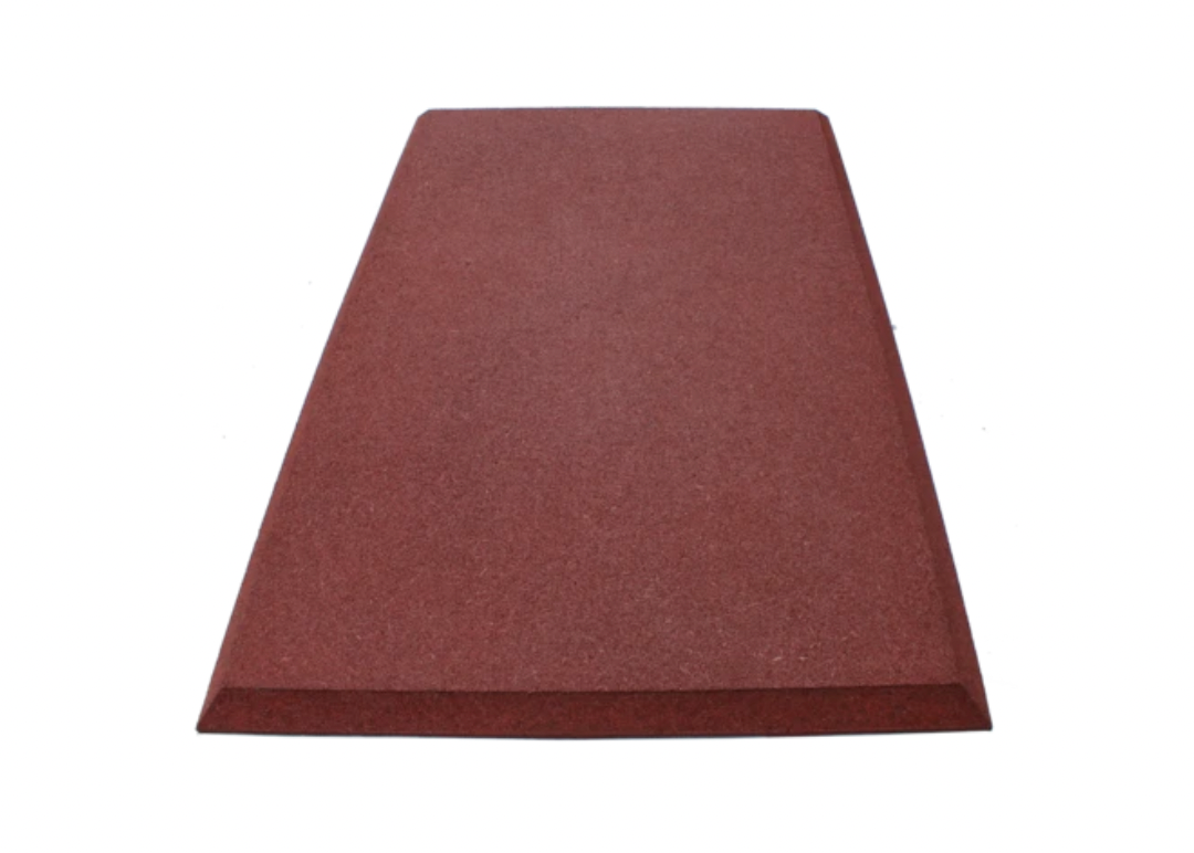 Red rubber safety mat with beveled edges for playground swing areas, durable non-slip surface designed for high traffic use