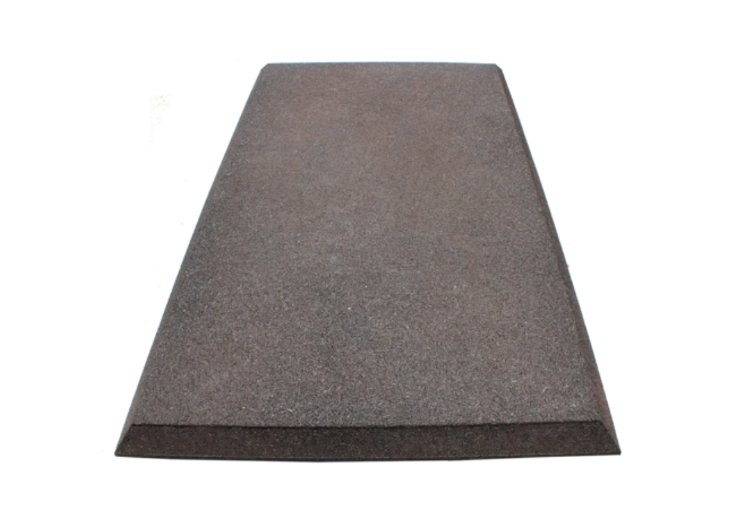 Brown rubber safety mat with beveled edges designed for playground swing areas, angled view